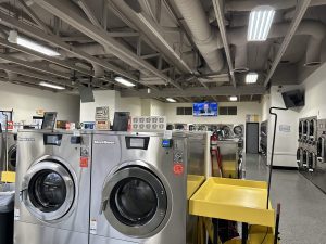 Folding tables inside laundromat facility